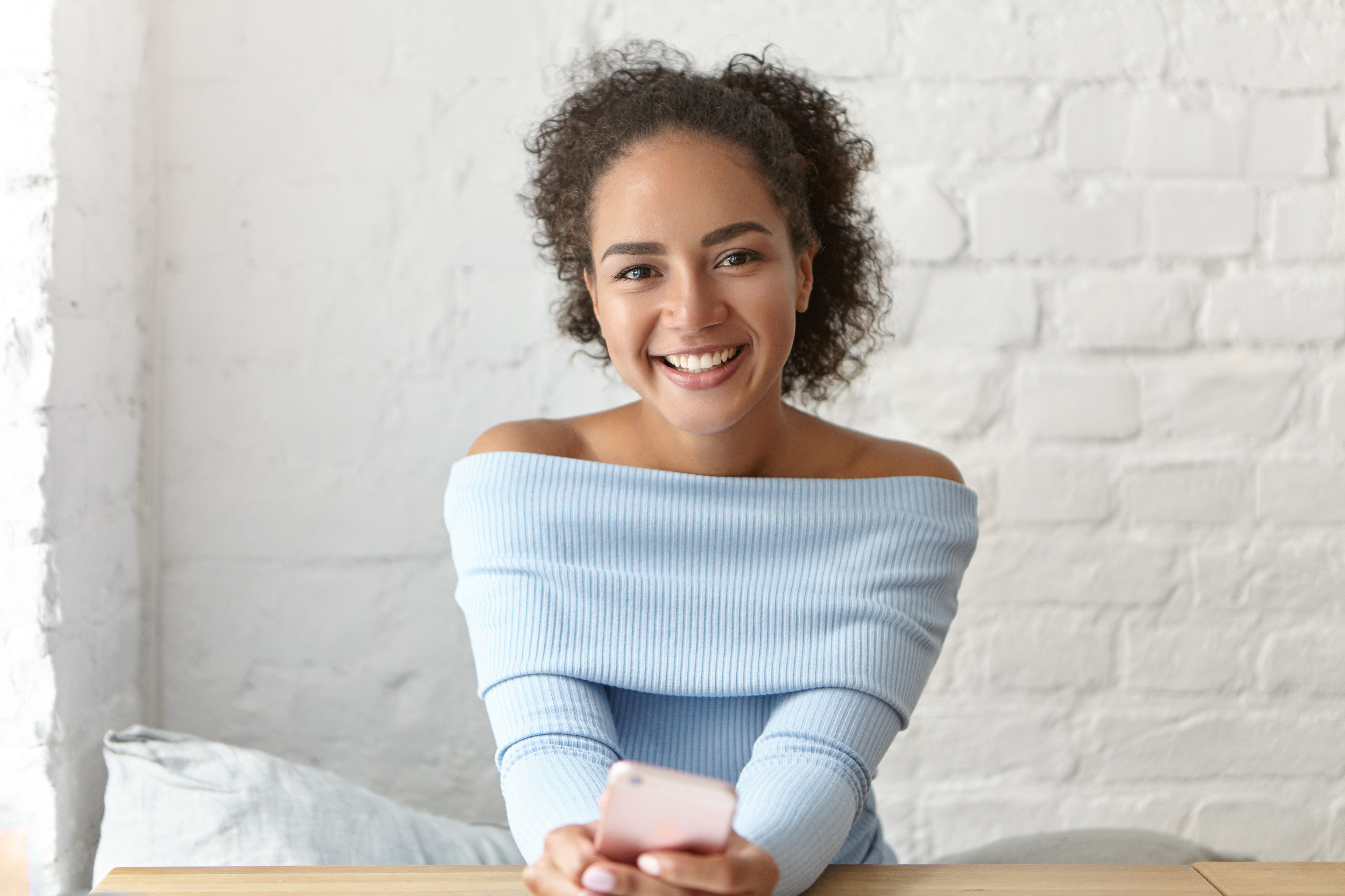 happy-girl-sitting-at-table